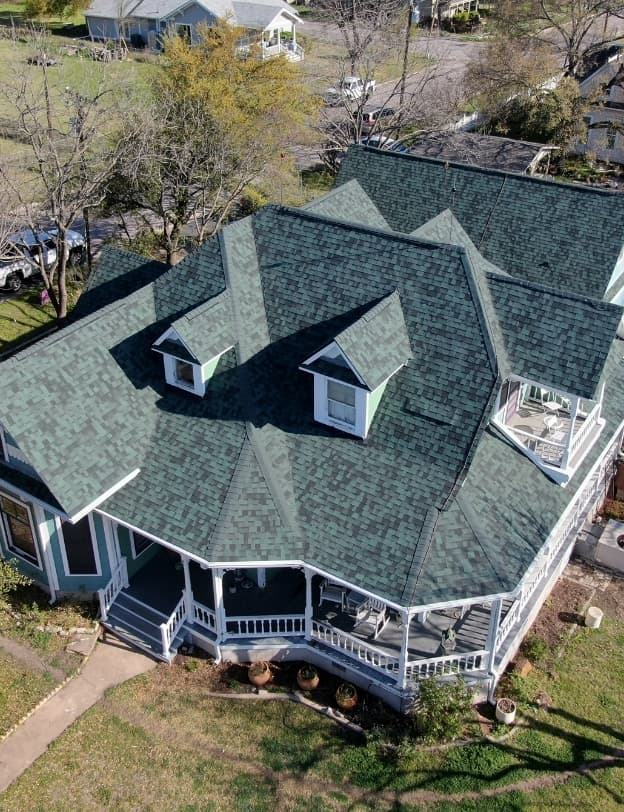 Aerial view of a completed roof replacement in Central Texas