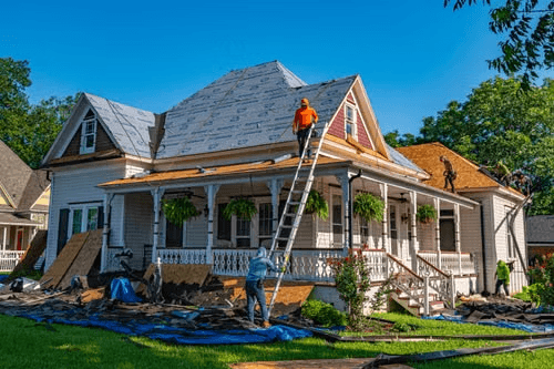 Recon Roofing crew working on a home in Liberty Hill, TX